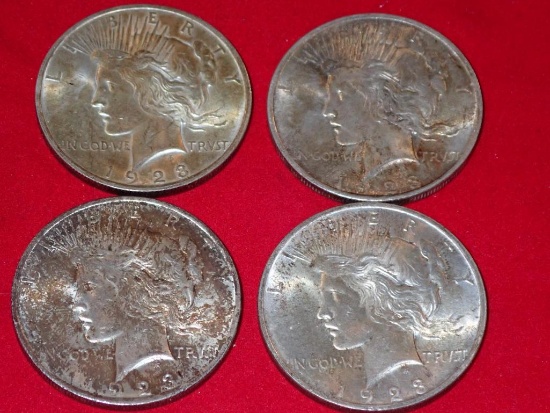 Four 1923 Peace Dollars