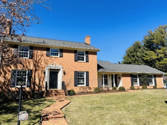 Stately Custom Brick Colonial and Brick Quadplex