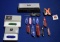 Swiss Army knife lot- 12 pocket knives and 3 sharpening items