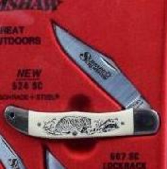 7 Schrade Scrimshaw Knives in Display Case