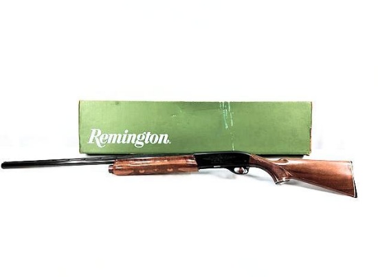 Remington Model 1100, 12 gauge shotgun