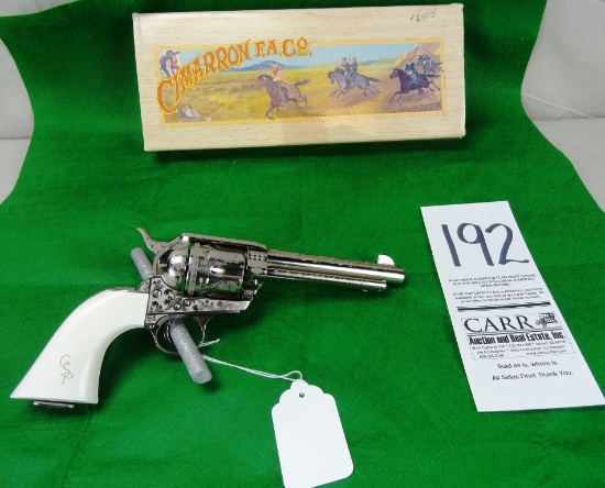 Cimarron Frontier, 4¾” Bbl., 45 Colt Engraved Silver/White Revolver, SN:E06