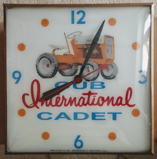 International Cub Cadet lighted clock (works), older, PAM Clock Co.