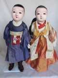 Two composition 1920s Ichimatsu boy dolls