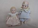 Two All-bisque German cabinet dolls
