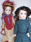 Two porcelain artist reproduction dolls