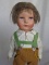 Two vintage dolls:- German swivel head