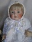 Two porcelain J.D. Kestner reproduction dolls:-