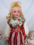 Three flawed dolls:- German All bisque