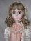 Reproduction artist Jumeau 'Long Face Bebe' 69cm porcelain doll. Good featu