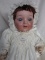 Bisque Japan MY Baby 38cm. Blue glass sleep eyes, angled lashes, feathered