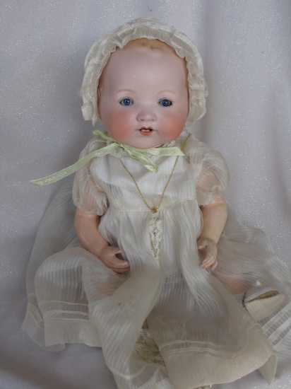 Bisque Armand Marseille 351 baby 17" (43cm) c1926. Blue glass sleep eyes, a