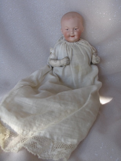 Bisque 1912 Gebruder Heubach laughing 7647 baby 20cm. Intaglio blue eyes, o