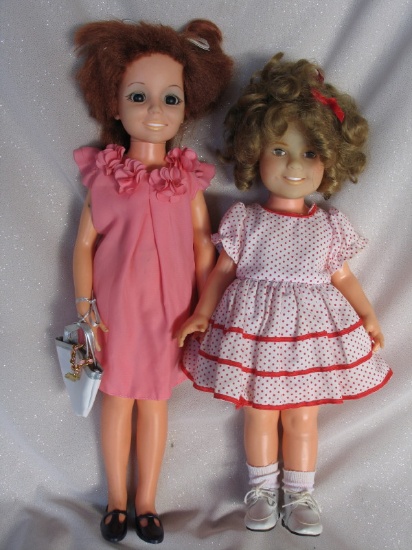 Five 70s dolls:- Three Crissy's in orange mini & red check & two with trim.
