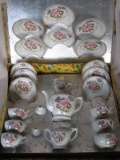 Boxed child vintage Japan Teaset twenty one piece. Hand painted flower patt