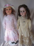 Two antique bisque dolls. Recknagel 1909 52cm, eyerim chip, sleep eyes, o-m