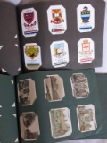 Four 1925-30s Cigarette Card Albums:- 1935 Bradman & McCabe postcards. Set