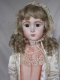 Reproduction artist Jumeau 'Long Face Bebe' 69cm porcelain doll. Good featu