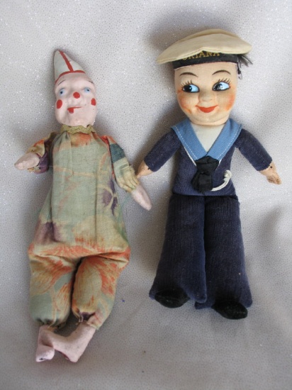 Mixed toys:- Mechanical carton moule 30s clown 23cm with push squeaker tumm