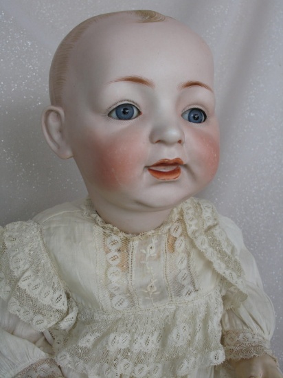 German J.D. Kestner 'Bald Head baby' 18” (46cm) bisque doll. Fixed blue gla