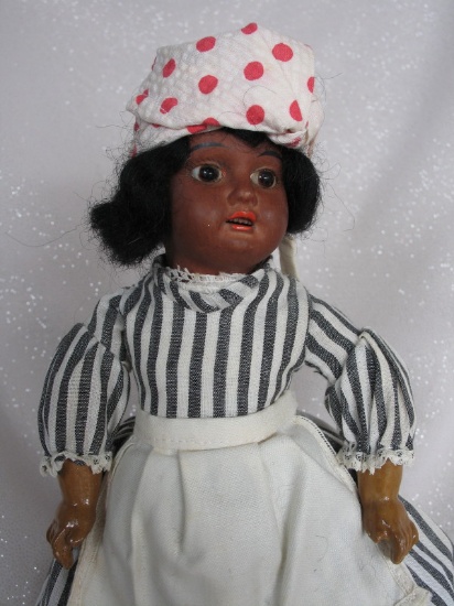 Cabinet Armand Marseille 1894 brown painted bisque doll 10" (26cm). Open re