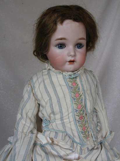 Bisque Kammer & Reinhardt child shoulder head 23" (59cm). Blue glass sleep