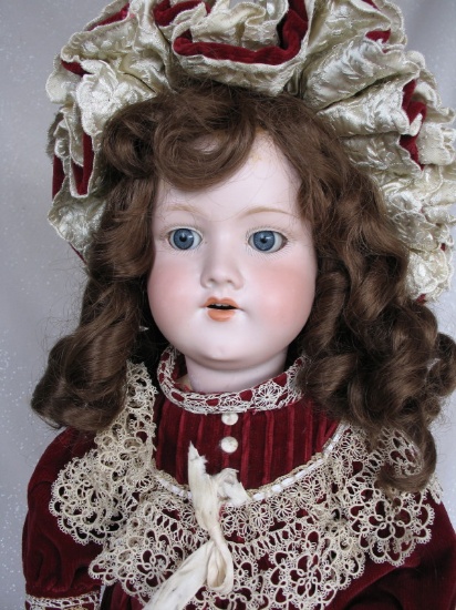 Bisque Armand Marseille 390 dolly face 24" (61cm). Blue glass s-eyes, angle