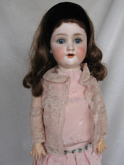 Bisque Adolf Heller dolly face 20" (51cm). Blue glass s-eyes, angled lashes