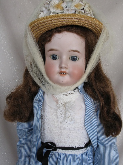 German Schoenau & Hoffmeister 1909 bisque doll 21.5" (55cm). Blue glass sle