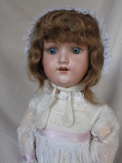 German Armand Marseille 390 bisque 21" (53cm). Blue glass fixed eyes only,