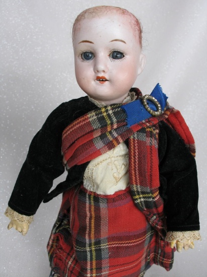 All original MOA 200 Scott regional bisque 13" (33cm). Blue glass sleep eye