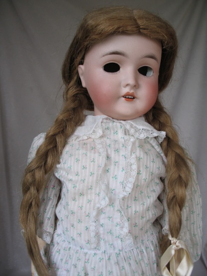 Bisque Armand Marseille 'Queen Louise' 23" (58cm). Brown glass eye rocker i