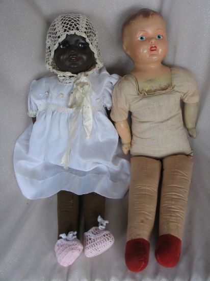 Two 1940s Dolls:- Brown composition 64cm swivel head baby, painted features