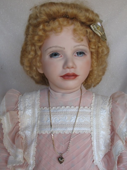 Porcelain reproduction artist Angelique girl 29" (74cm). Blue painted eyes,