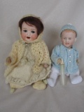 Two German cabinet dolls:- Recknagel 20cm Baby with o/closed laughing mouth