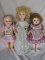 Three 1950s hard plastic dolls:- Roddy walker 41cm in bridesmaids lace outf