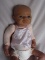 Two friends:- Ashton Drake reborn baby 51cm with nappy. Merrythought Harrod