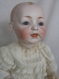 German J.D. Kestner 'Bald Head baby' 18” (46cm) bisque doll. Fixed blue gla