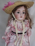 Shoulder head J.D. Kestner 154 child 22.5” (57cm) c1897 bisque doll. Brown
