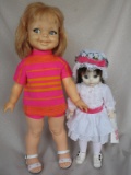 Two dolls:- Ideal Giggles 1966 in original pink stripe top/pants, head move