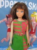 Two Mattel Barbie Skipper dolls:- 1960s Skipper with faded right arm in 'Lo