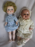 Two Dolls:- German composition flirty baby 33cm c1930s. Swivel head, blue g