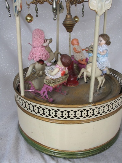 Working child 1920s Tin Clockwork Carousel Merry-Go-Round. Possible German