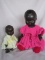 Two Dark Brown OK Kader babies, 35cm missing teeth and tongue in pink knit.