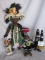Five dolls. Two African Fertility turned wood dolls 22cm. Two African felt