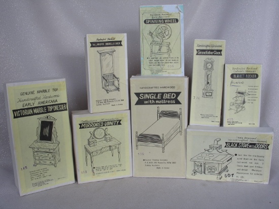 Twenty-two (22) Roussel dollhouse wood furniture MIB include armoire, hutch