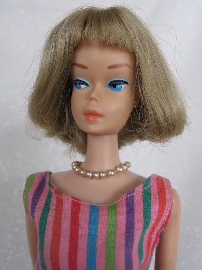 Mattel 1966 Barbie American Girl with a shiny ash-blonde center part hair w