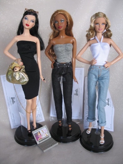 Fourteen Mattel 'Barbie Basics' Series 2. Original outfits and stands, two