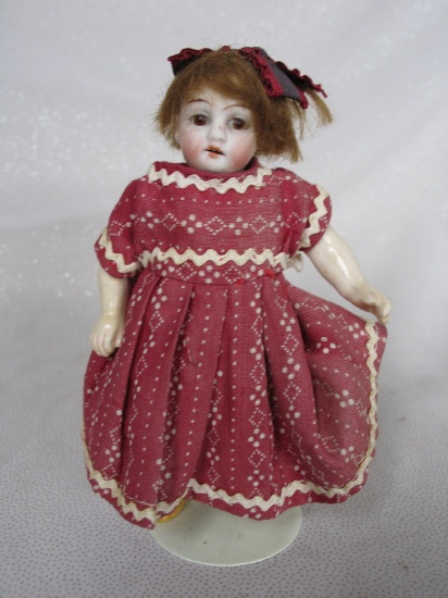 Antique German cabinet child 5" (13cm) bisque. Inserted brown glass eyes, o