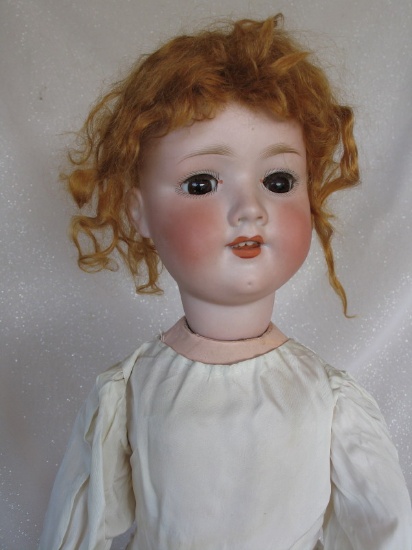 Bisque Armand Marseille 390 23" (58cm). Brown glass sleep eyes, real lashes
